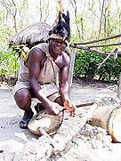 Ngomongo Village - Luo clans man playing stringed instrument